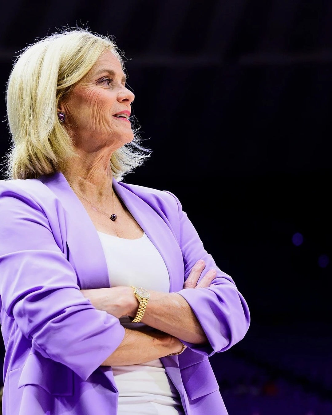 Coach Kim Mulkey on the sideline at the PMAC in the lavender LSU tiger blazer