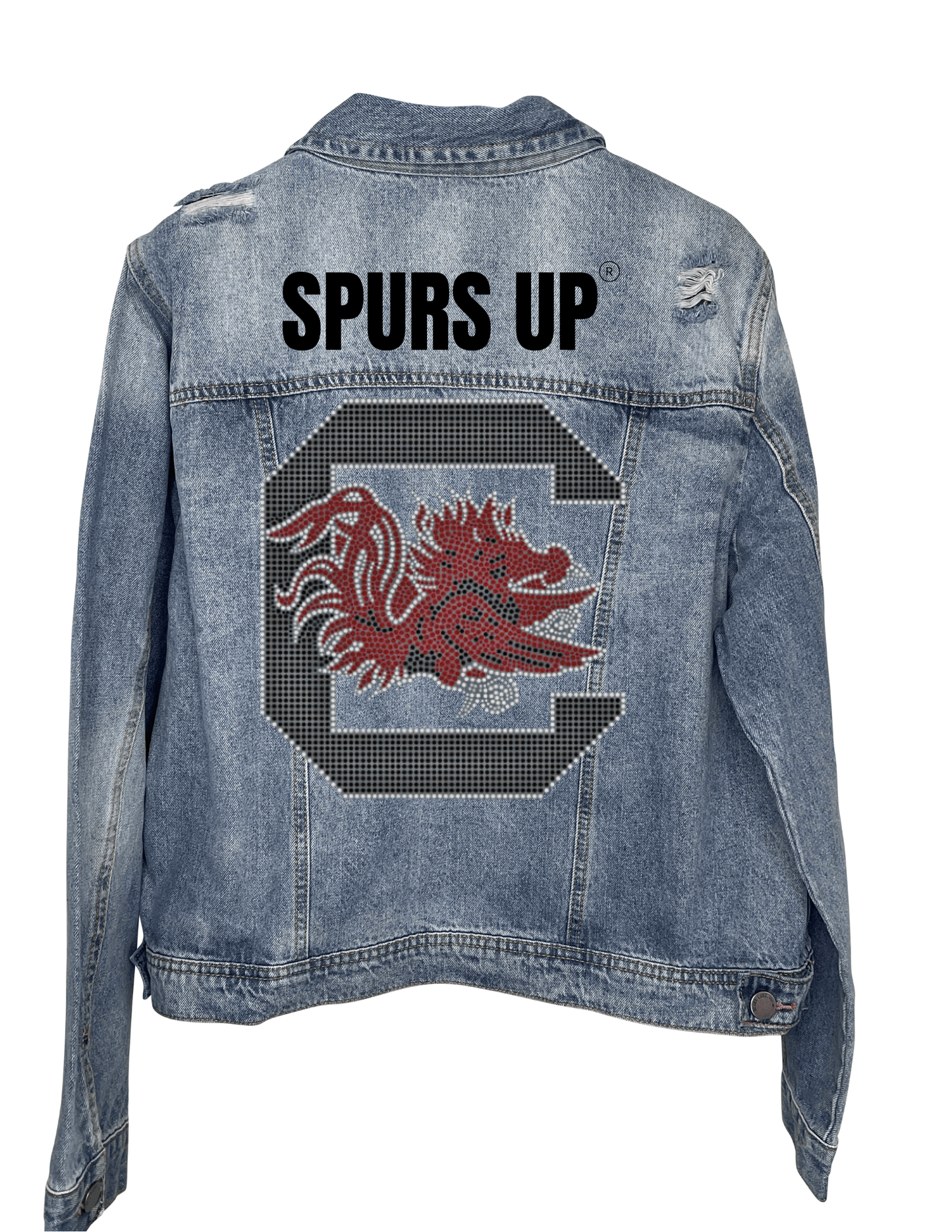 A denim jacket with a crystal Spurs Up Gamecock design on the back, featuring a pointed collar, button front, and pockets.