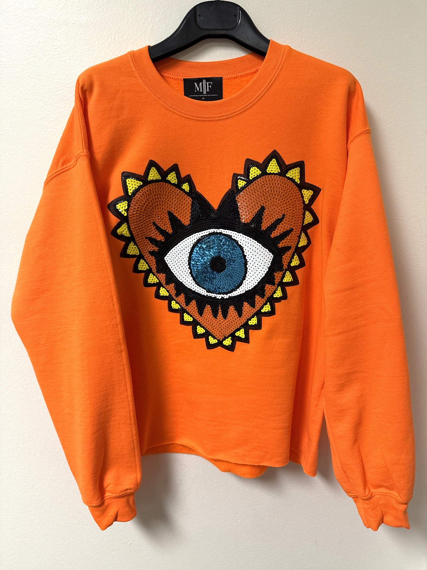 Sweatshirt, Crewneck Neon Orange, Sequin Orange Heart Eye